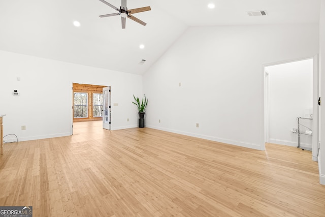 unfurnished living room featuring light wood-type flooring, high vaulted ceiling, and ceiling fan