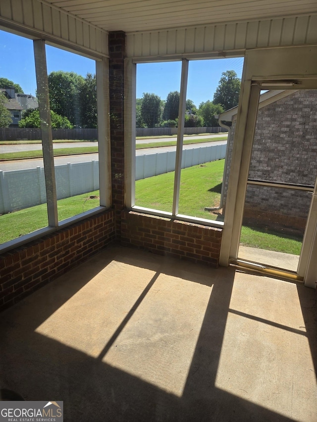 sunroom / solarium featuring plenty of natural light