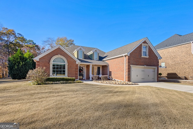 view of front of house with a front lawn and a garage