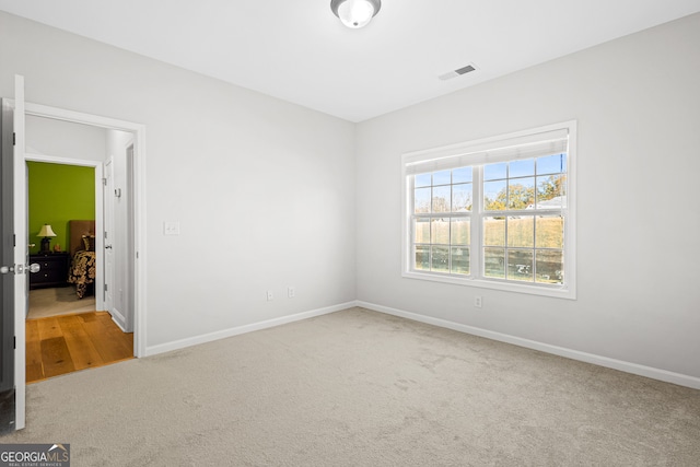 view of carpeted spare room