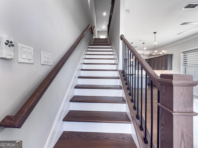 staircase with visible vents