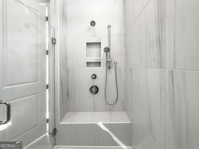 full bathroom with a stall shower