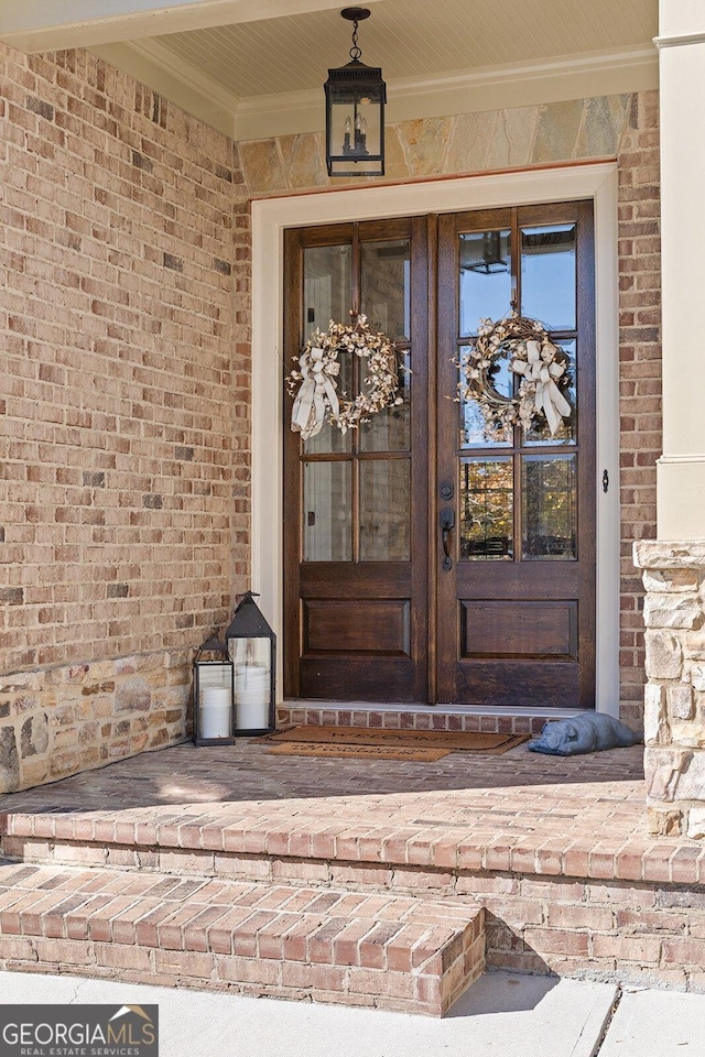 entrance to property featuring french doors