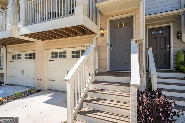 property entrance with a garage