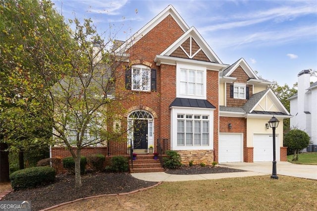 view of front of home featuring a garage and a front lawn