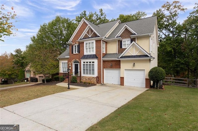 view of front of home featuring a front lawn and a garage