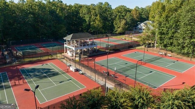 view of sport court with basketball hoop