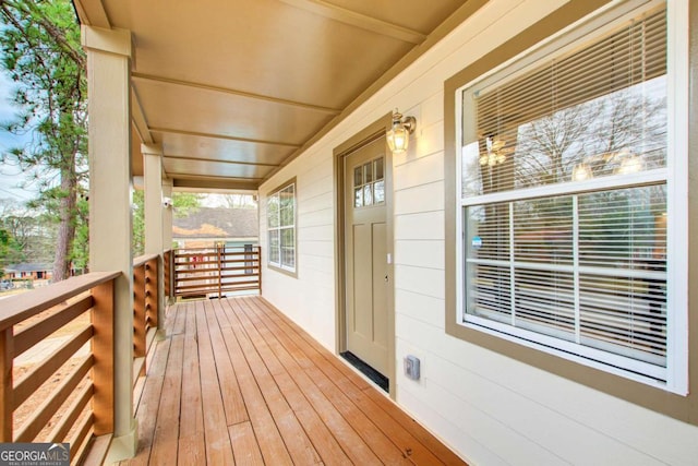 deck with covered porch