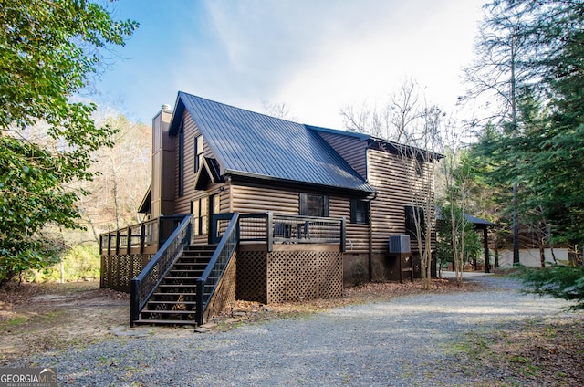 exterior space with a wooden deck