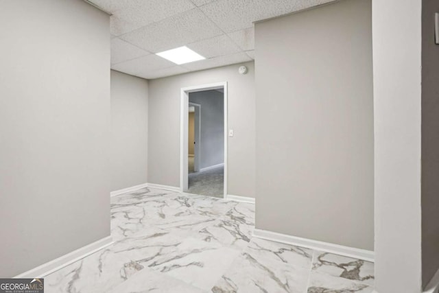 bedroom featuring a paneled ceiling