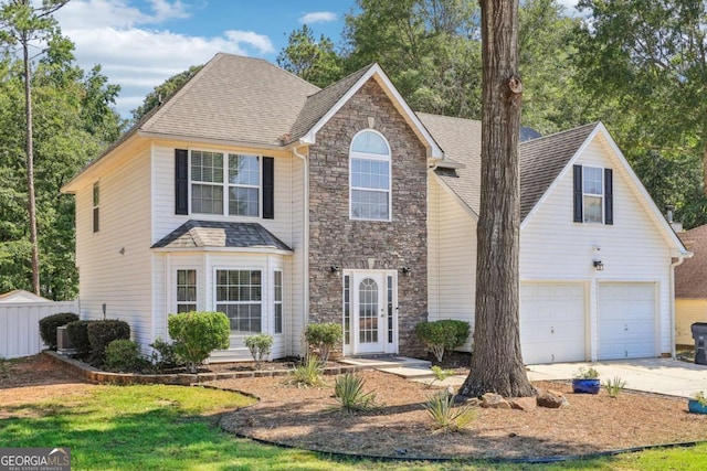 view of front of property with a garage