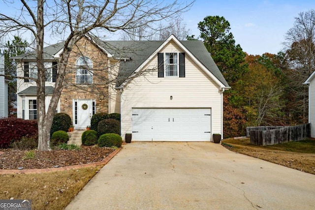 view of property with a garage