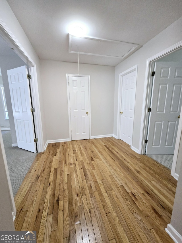 empty room with wood-type flooring