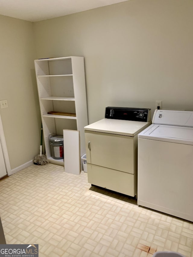 laundry room with washer and dryer