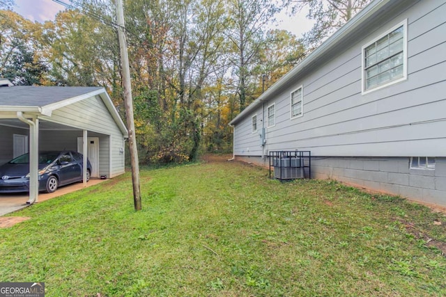 view of property exterior featuring a lawn and a carport