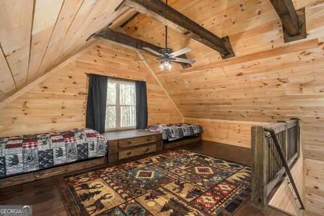 bedroom featuring hardwood / wood-style floors, lofted ceiling with beams, and wooden walls