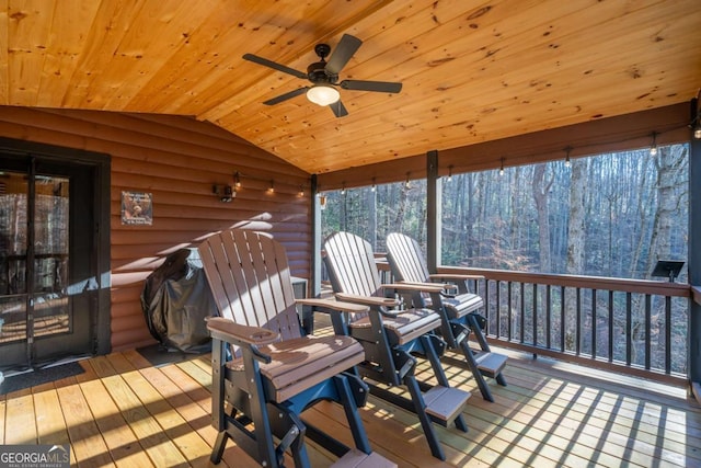 wooden deck featuring ceiling fan