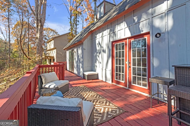 wooden deck with french doors