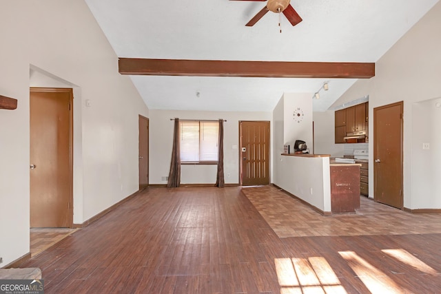 unfurnished living room featuring hardwood / wood-style flooring, lofted ceiling with beams, and ceiling fan