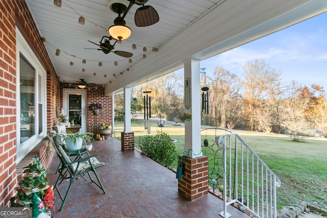 131 Logan Cir, Ellijay, GA 30540 - covered porch featuring ceiling fan and a yard