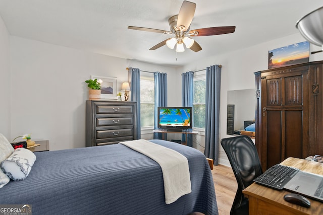 131 Logan Cir, Ellijay, GA 30540 - bedroom featuring light wood finished floors, an office area, and ceiling fan