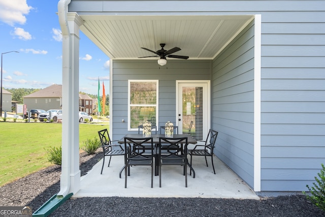 view of patio with ceiling fan