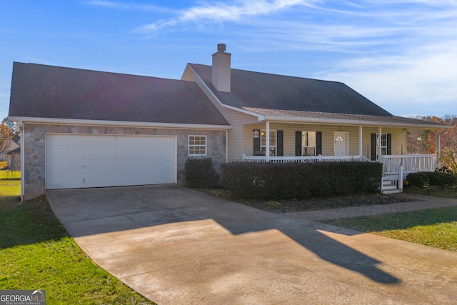 view of front of home with a garage and covered porch