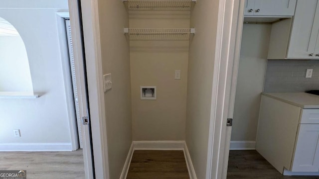 laundry area featuring light hardwood / wood-style floors