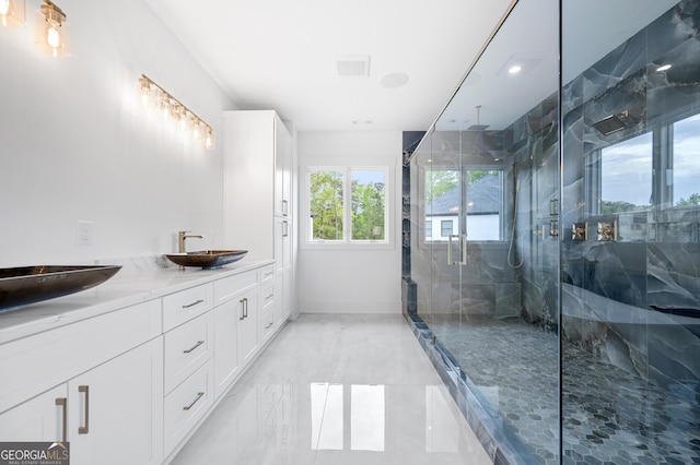 bathroom with vanity and walk in shower