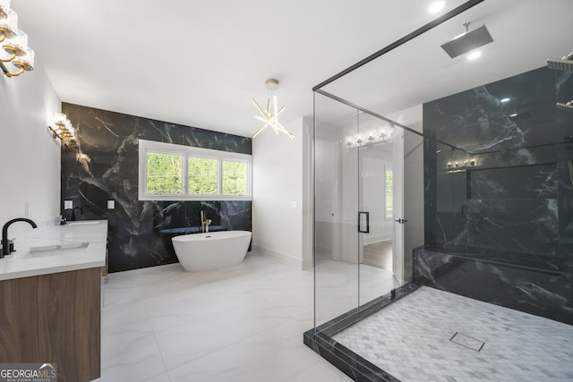 bathroom featuring vanity, tile walls, and independent shower and bath