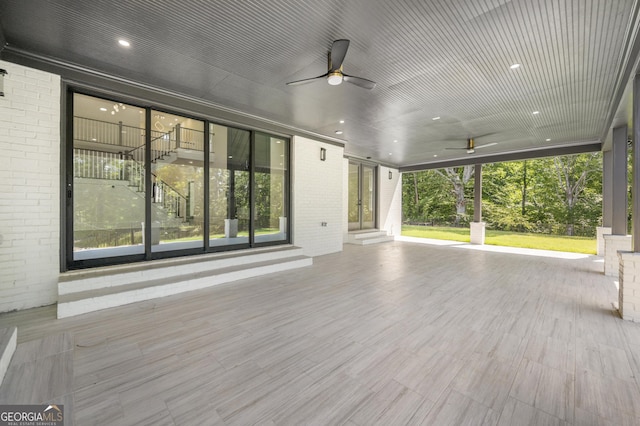 view of patio / terrace featuring ceiling fan