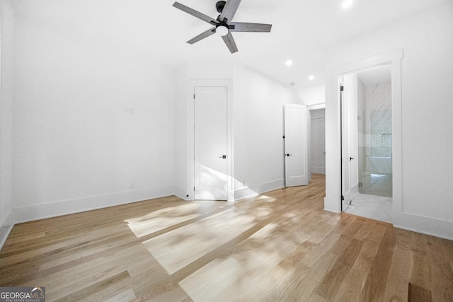 interior space with light hardwood / wood-style flooring and ceiling fan