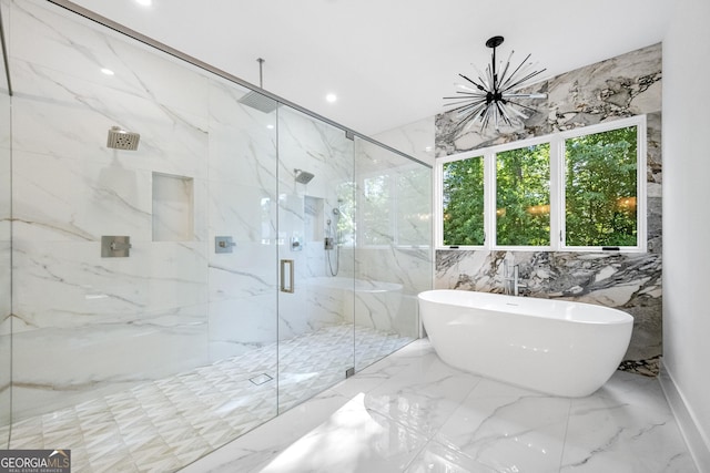 bathroom with tile walls and plus walk in shower