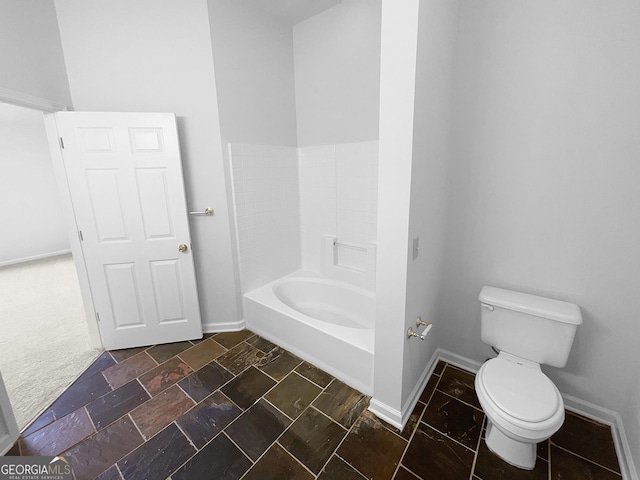 4279 Orchard Grv, Stone Mountain, GA 30083 - bathroom with toilet and a tub