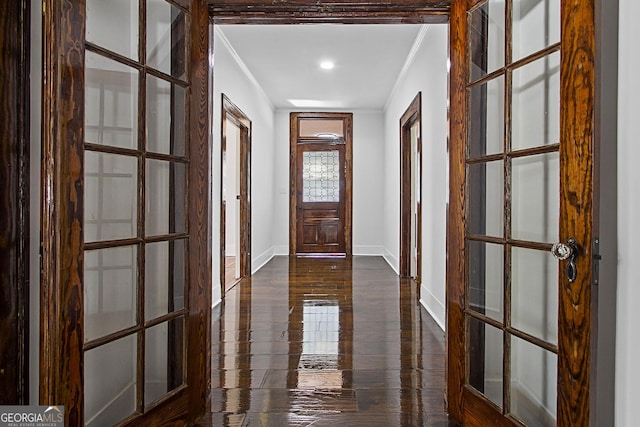 entryway featuring french doors and ornamental molding