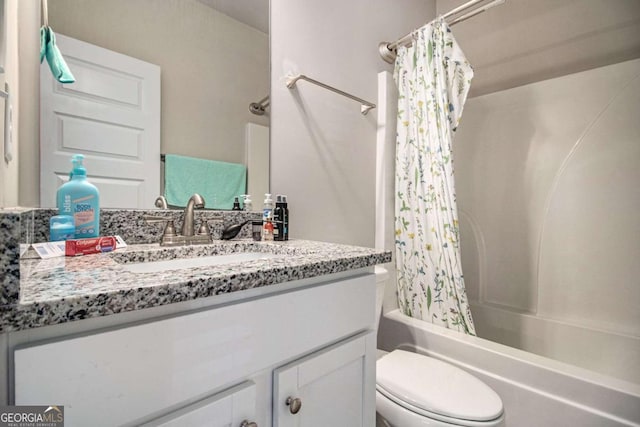 full bathroom with vanity, toilet, and shower / tub combo with curtain