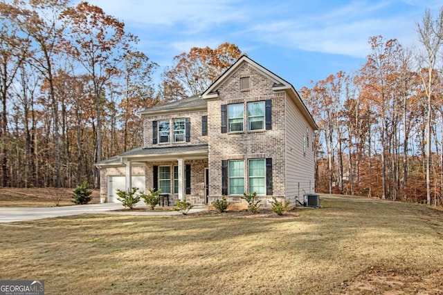 view of front facade featuring a porch, a front lawn, central AC unit, and a garage