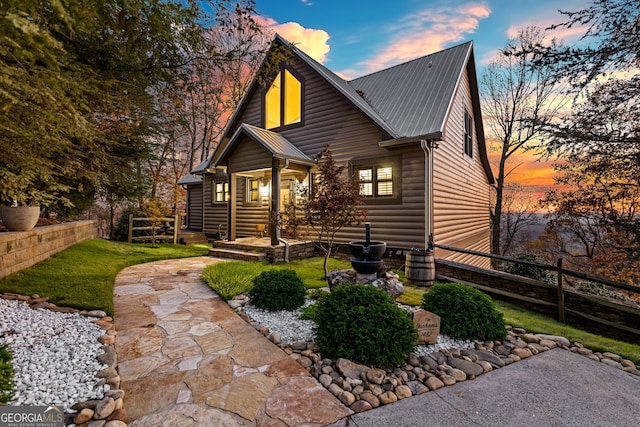 back house at dusk with cooling unit