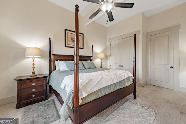 bedroom with light carpet, a closet, and ceiling fan