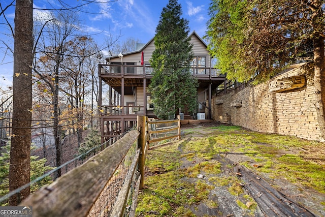 rear view of property with a deck