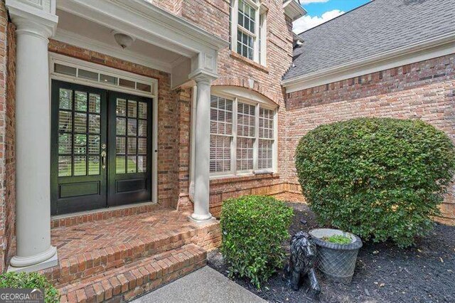 view of front of home with a garage and a front lawn