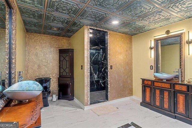 interior space with walk in shower and vanity