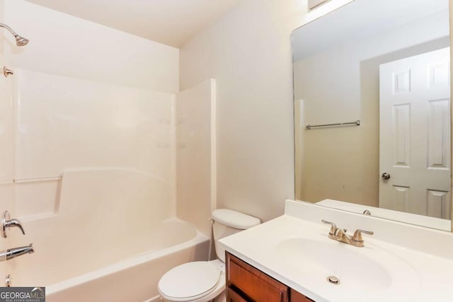 full bathroom with vanity, toilet, and shower / bathtub combination