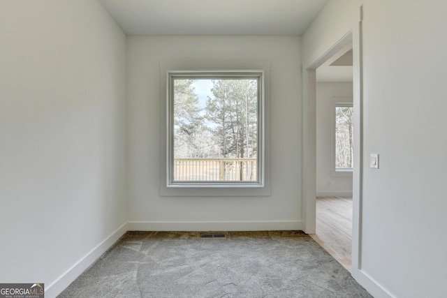 view of carpeted spare room