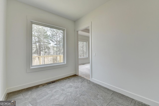 view of carpeted spare room