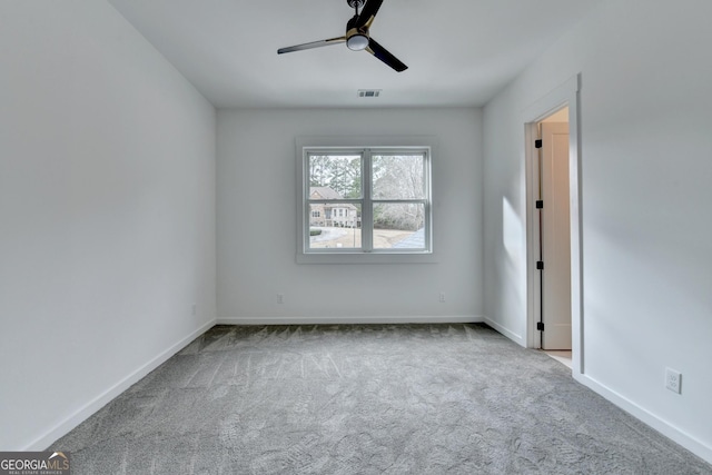 unfurnished bedroom featuring light colored carpet and ceiling fan