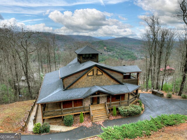 view of front of house featuring a mountain view and a porch