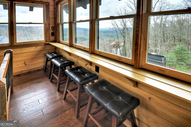 sunroom / solarium with a healthy amount of sunlight