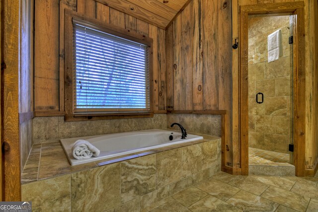 bathroom with independent shower and bath