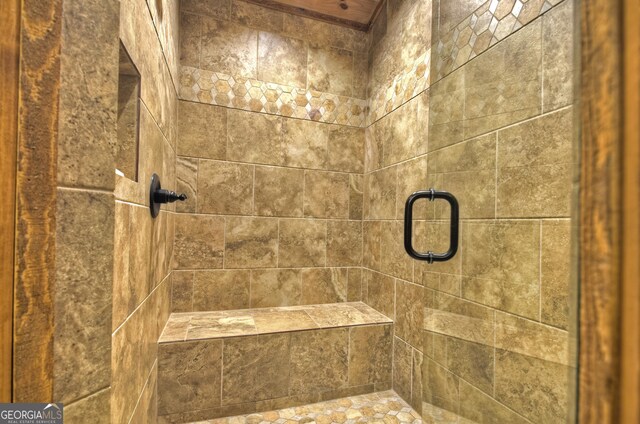 bathroom featuring an enclosed shower